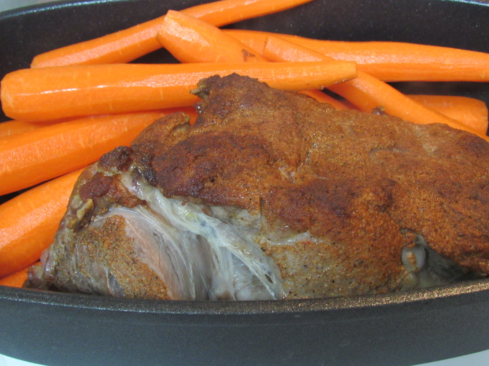 Prepare your carrots and dice or slice an onion to add and add both to your roaster then pop back in the oven for an hour.